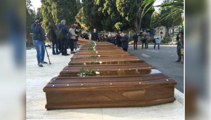 Italy buries 26 victims