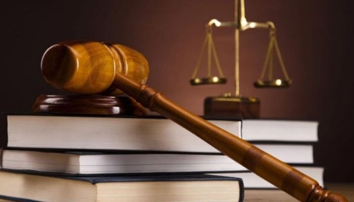 A Gavel on a pile of books