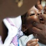 Child receiving medicine