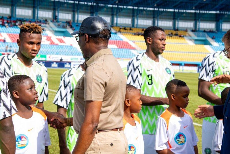 Dollar rain in Asaba as Gov. Okowa rewards Super Eagles with $60,000