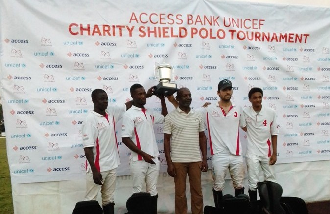 Players of Fifth Chukker team show off their Usman Dantata Cup with Sayyu Dantata, sponsor of the cup which was decided Sunday at the ongoing 2019 Access Bank UNICEF Charity Shield polo tournament in Kaduna
