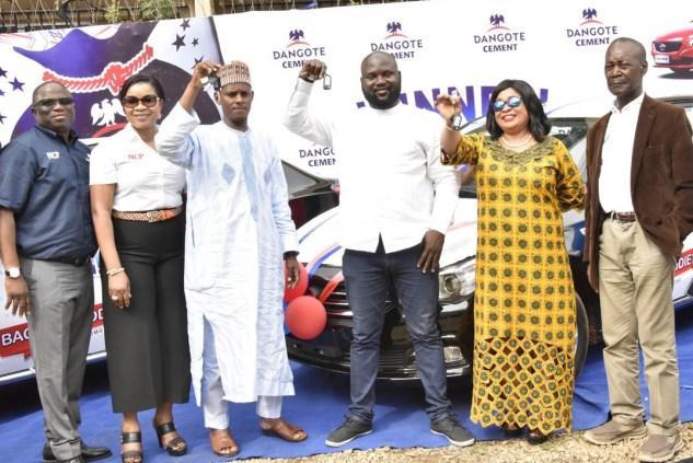 Dangote gives four new cars to cement customers