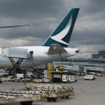 Cathay Pacific hit as protesters flood back into Hong Kong airport