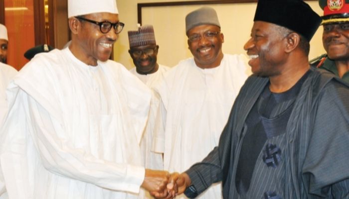 President Buhari shaking former President jonathan