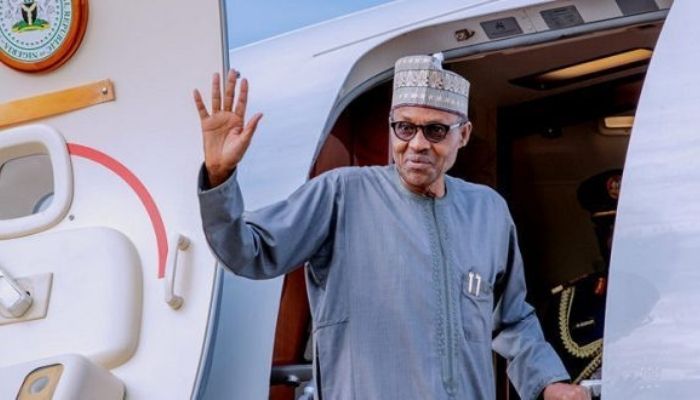 President Muhammadu Buhari entering his private jet