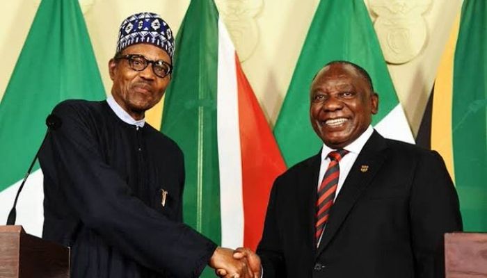 President of Nigeria, President Muhammadu Buhari shaking South African President, Matamela Cyril Ramaphosa