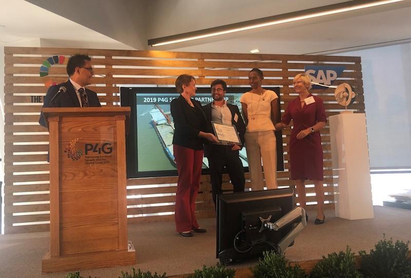 Amy Jadesimi, managing director of LADOL (m); Gail Klintworth (r), and Robbie Marwick (l) from Systemiq, when the trio collected the P4G award for Sustainable Special Economic Zones recently in New York.​ ​​