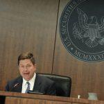 Wall St’s top cops defend new focus on Main St