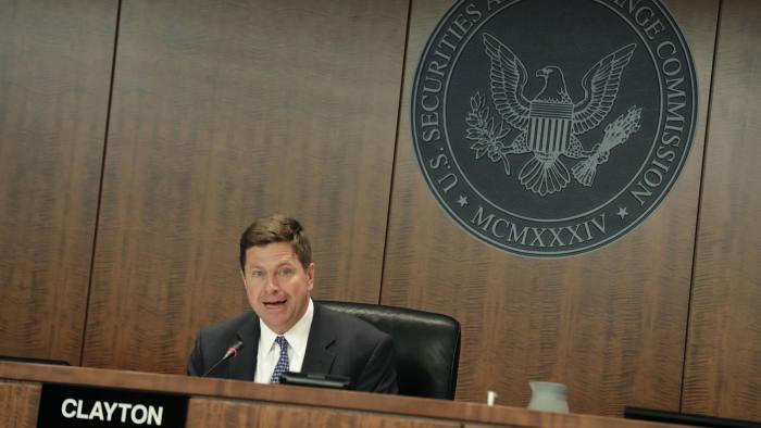 Wall St’s top cops defend new focus on Main St