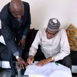 Buhari signs law amending Nigeria’s oil contracts
