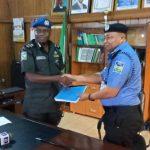 L–R: Outgoing Commissioner of Police, DanMallam Mohammed handing over to his successor, Lawan Tanko Jimeta, at the Edo State Police Headquarters, Benin.