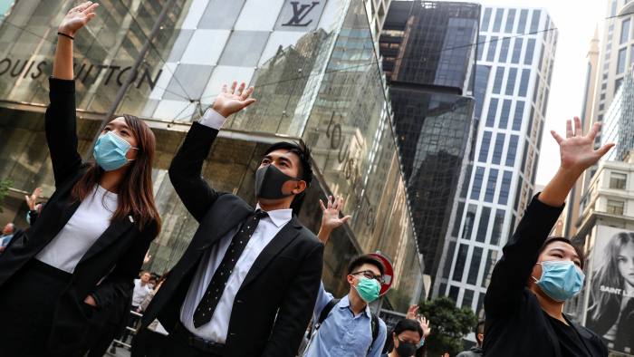 Employers act to protect staff as Hong Kong crisis deepens