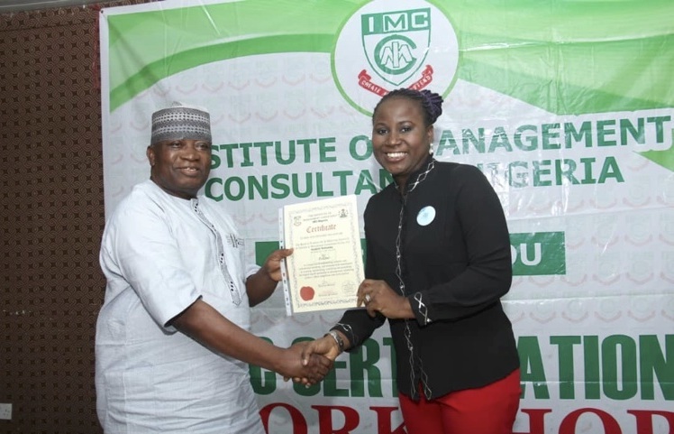 Olabisi Sotunde receives IMC Fellowship