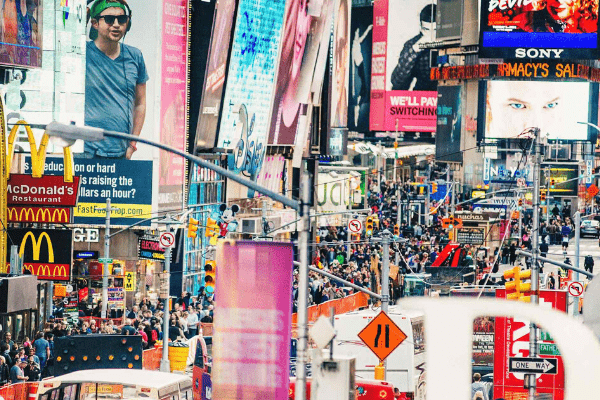 The more a country spends on ads, the less satisfied its citizens are