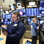 Global stocks edge lower as coronavirus concerns linger