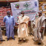 Mohammed Garba (c) Kano State commissioner for Information, receiving the relief materials donated by Gala Investment Limited, while, on the left side, is Oke Godwin, human resources manager; Ali N. Abdallah, admin manager, and Muhammad Danazumi, marketing manager of the company.