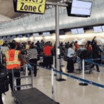 "an airport full of Nigerian evacuees"