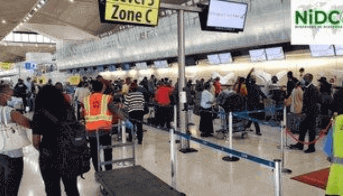 "an airport full of Nigerian evacuees"