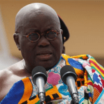 "Paul Ejime giving a speech "