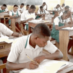 Stidents writing an exam in a hall