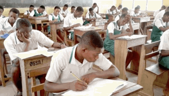 Stidents writing an exam in a hall