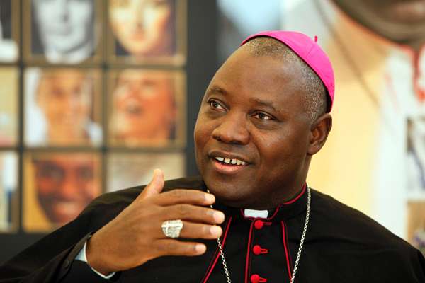 "Rev Ignatius Kaigama gesture his hand"
