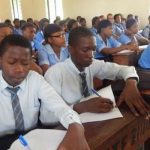 SS3 students writing an exam