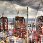 Building power plants in a regulated price regime