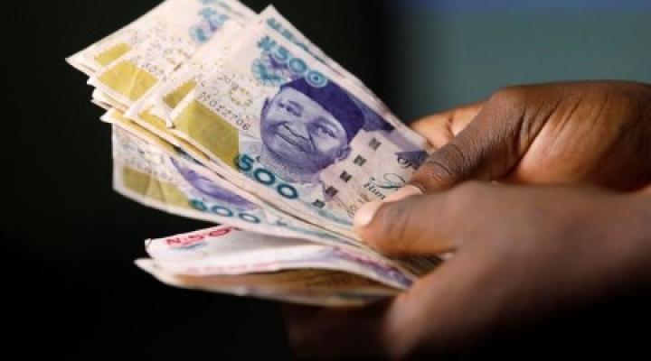 Naira gains N1.66k as central bank’s dollar sales calm FX market pressure