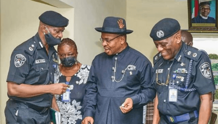 Gov Udom and two policemen