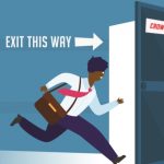 Businessman running to escape exit