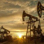 Oil inches above $74 a barrel as global inventories fall