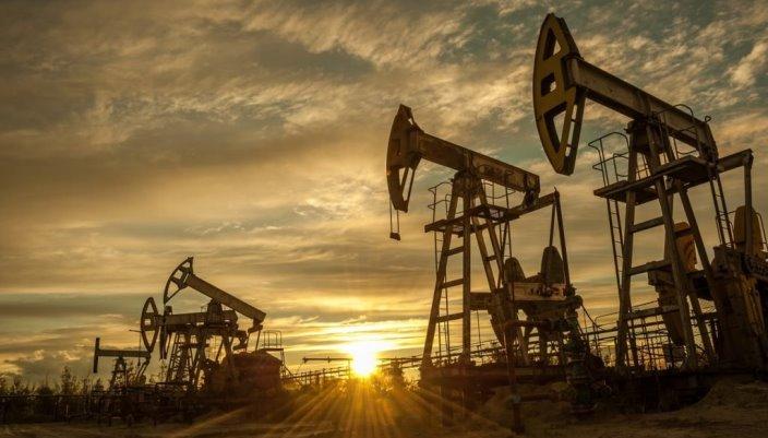 Oil inches above $74 a barrel as global inventories fall