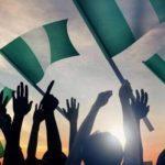 Nigerians waving flags