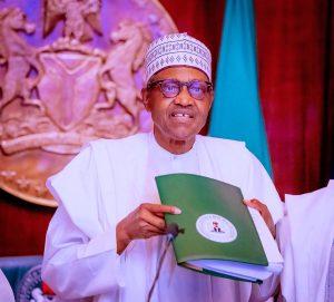 President Muhammadu Buhari signs the Electoral Act Amendment Bill into Law