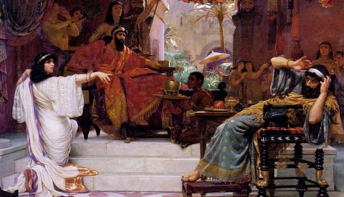 Queen Esther pointing at surprised Haman as the enemy of her people...and the rest is history