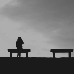 A lady sitting alone