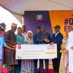 Governor Babajide Sanwo-Olu, flanked by Senator Tokunbo Abiru and other dignitaries (1)