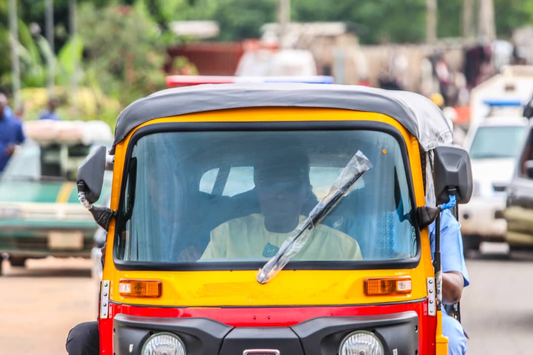 obasanjo rides keke in Abeokuta