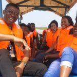 Isaac Moses and Nneka Isaac Moses with others, during a boat ride
