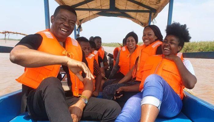 Isaac Moses and Nneka Isaac Moses with others, during a boat ride