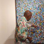 Ablade Glover, explaning his work at the opening day of the exhibition