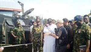 Minister of Transportation, Muazu Sambo, (in white), others inspect special equipment including drone