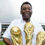 Pele with three World Cups