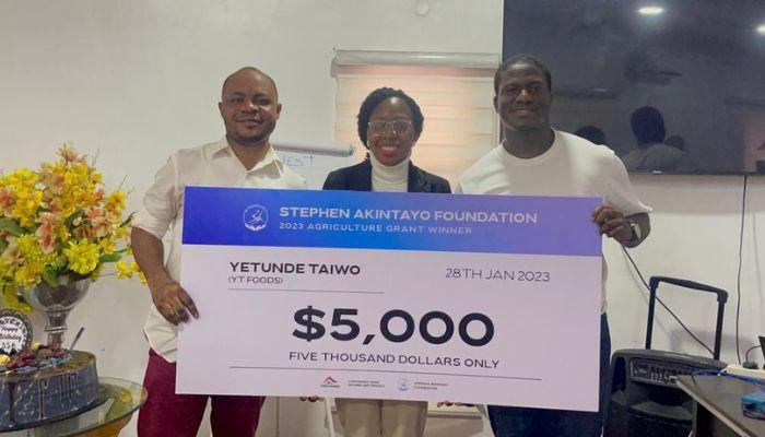 L-R: Joshua Olulana, executive, Stephen Akintayo Foundation; Yetunde Taiwo of YT Foods, recipient of the $5, 000 grant, and Ikenna Mba, accountant of the Foundation, during the presentation of grant to awardees of the Stephen Akintayo Foundation 2023 Agriculture grant to winners in Lagos.