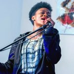 Woman holding microphone