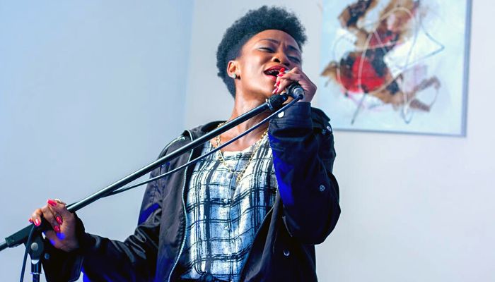 Woman holding microphone