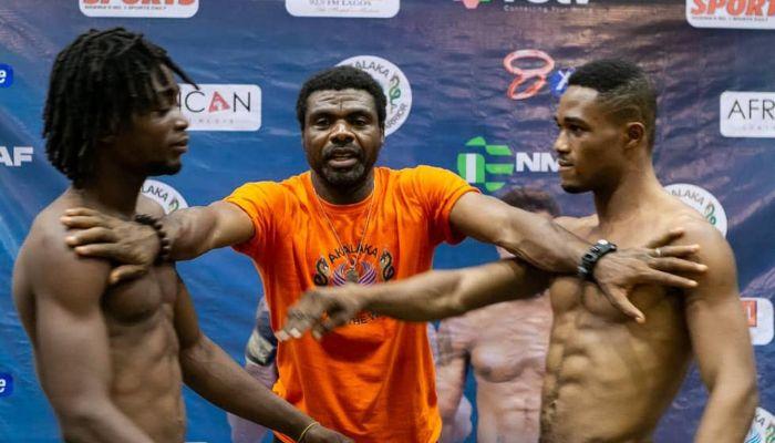 Ebere in the middle of young Mixed martial artists