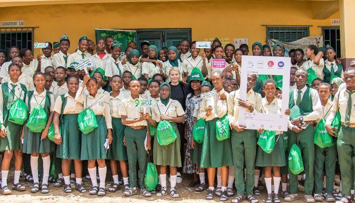 Chief Executive Officer and Managing Director, 9 Payment Service Bank, Branka Mracajac; the Principal, Ajao Estate Senior Grammar School, Mrs. Olabiran Ademola Angela and a cross-section of Ajao Estate Senior Secondary School Students, during the Global Money Week enlightenment campaign at Ajao Estate Senior Grammar School Lagos.