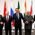 BRICS leaders holding hands